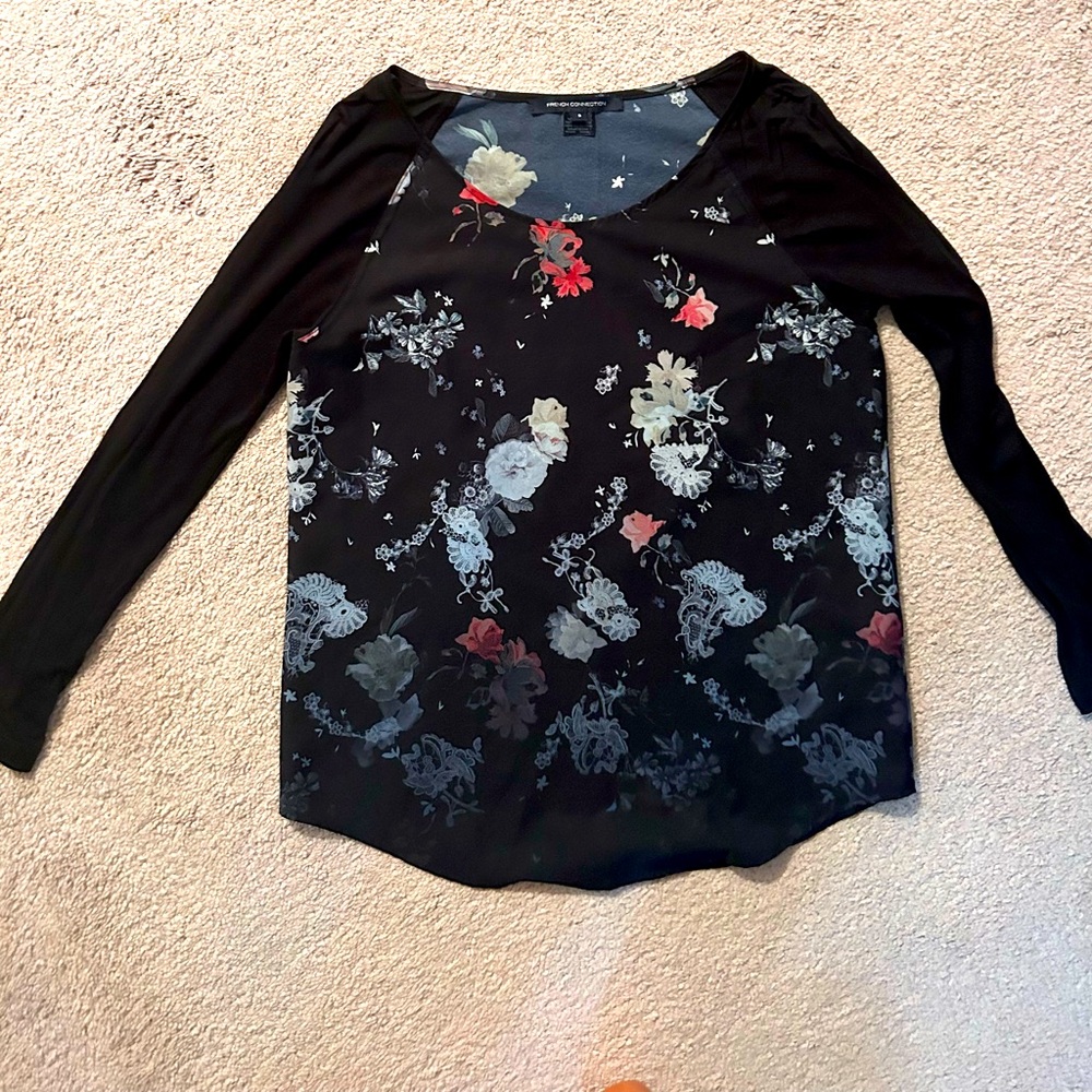 Beautiful floral French Connection brand top.  Loose flowy fit.
